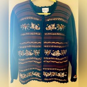 Embroidered long sleeve sweater. Beautiful design. Perfect for holidays.
